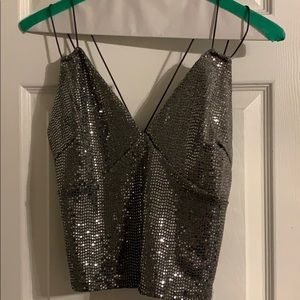 Sequin silver crop top.